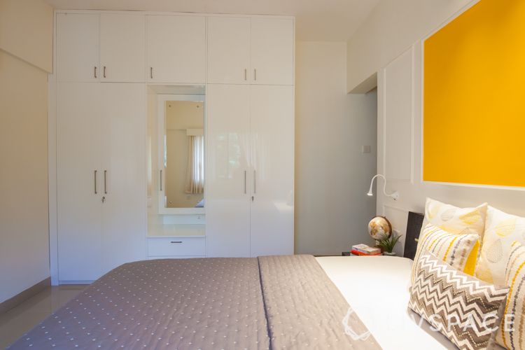 small house interior design-white bed-blue wall-white study unit design