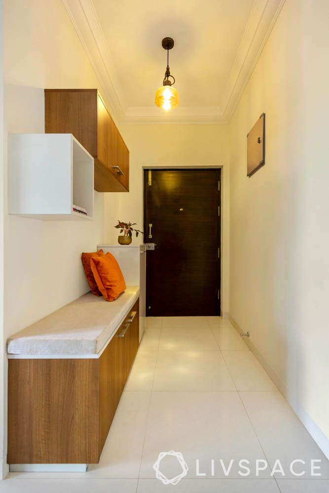 2 BHK in Bangalore-foyer-pendant light-storage-walnut finishes