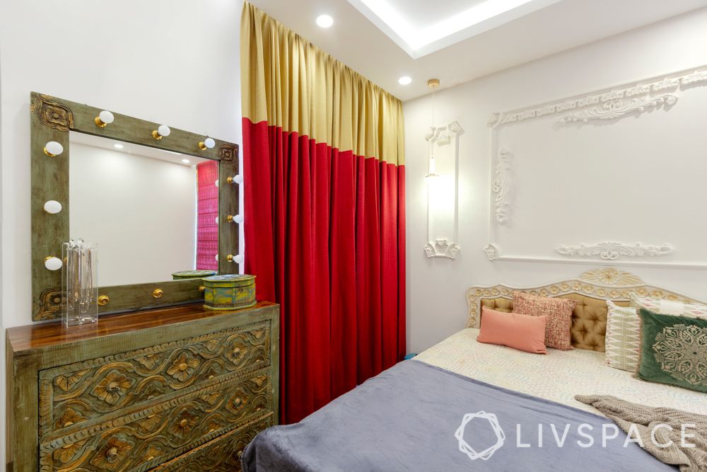 vintage-master-bedroom-POP-carving-wall-sari-curtain