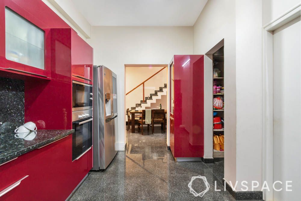 villa design-kitchen-red cabinets-membrane finish-granite backsplash-granite countertop