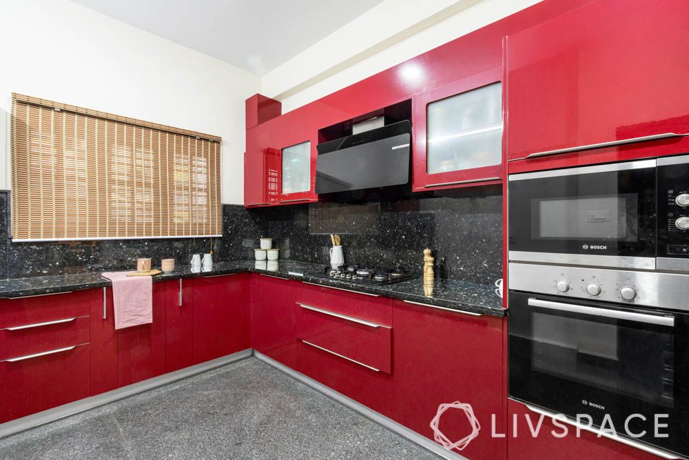 villa design-kitchen-red cabinets-membrane finish-granite backsplash-granite countertop