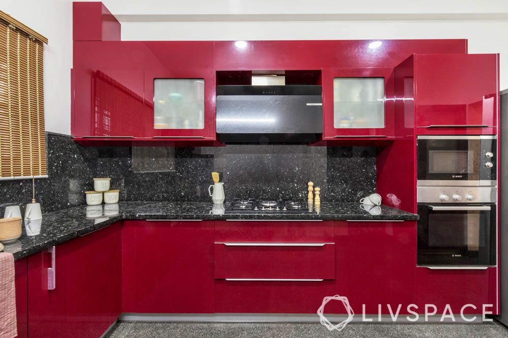 villa design-kitchen-red cabinets-membrane finish-granite backsplash-granite countertop