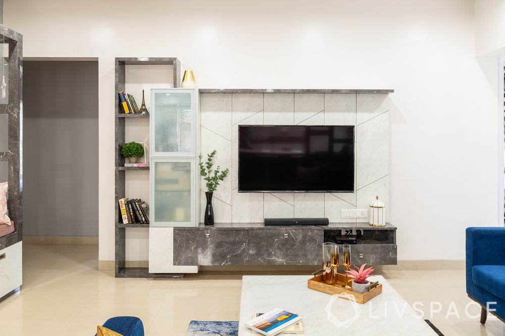 interior designers in pune-white tv unit-stone laminate finish