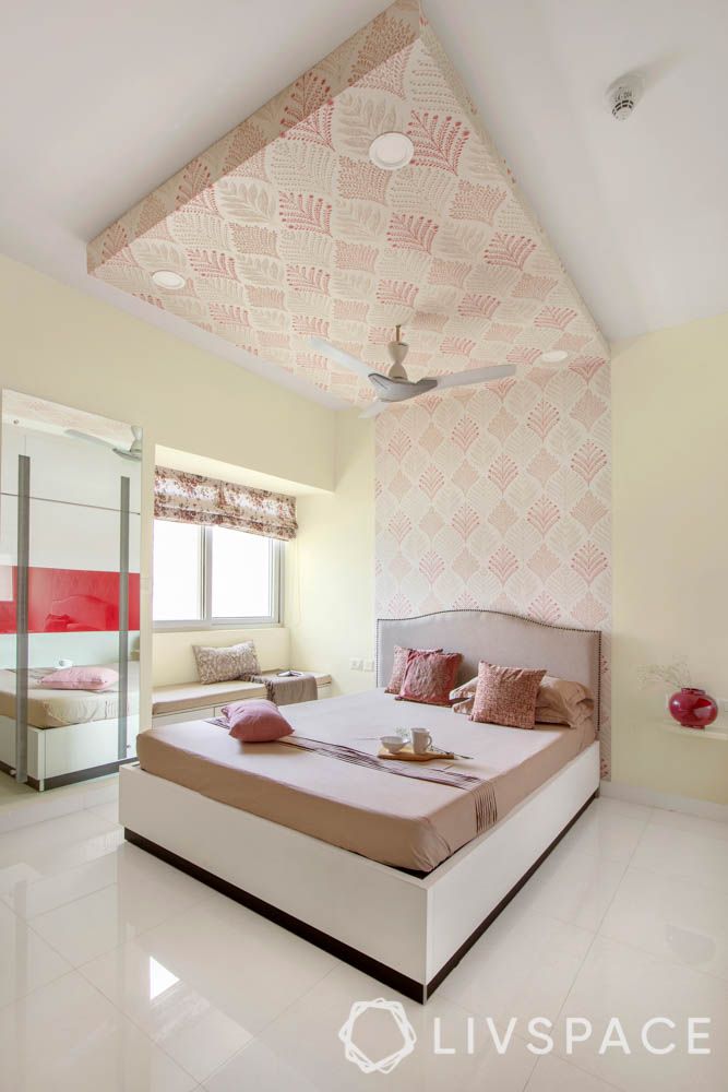 beautiful house design-wall to ceiling headboard-motif designs-beige bed-bay seating