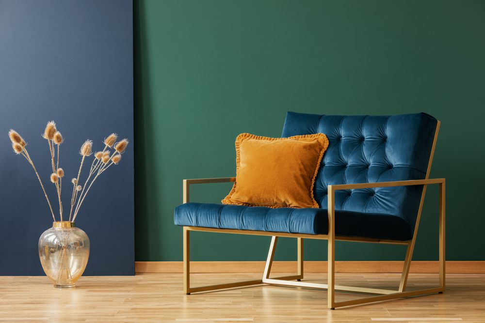 blue armchair-green wall