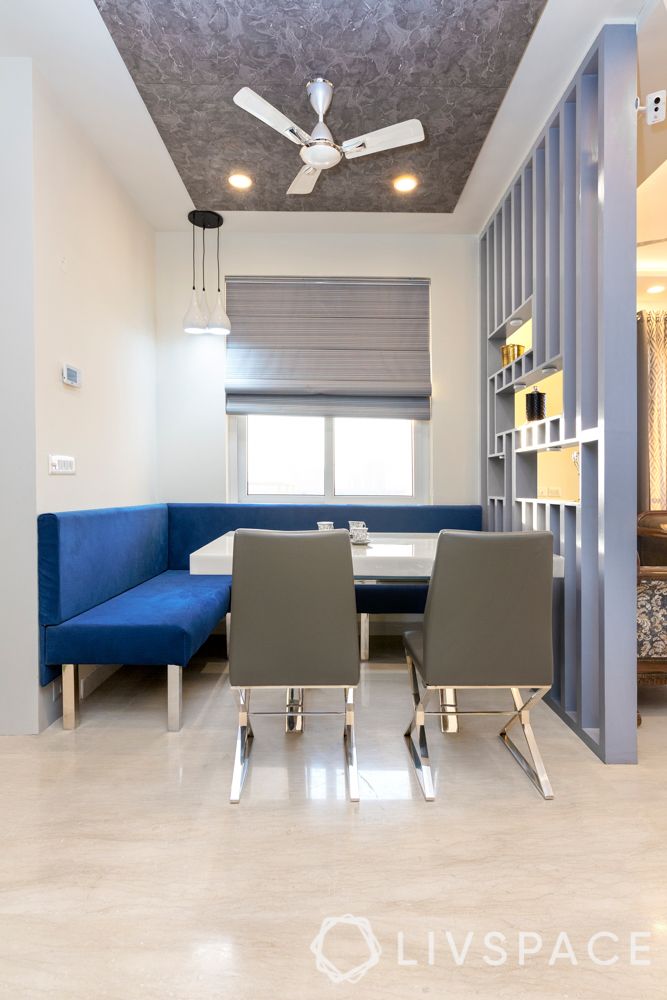 3BHK Room Design-dining room-grey chairs-grey partition-blue velvet bench
