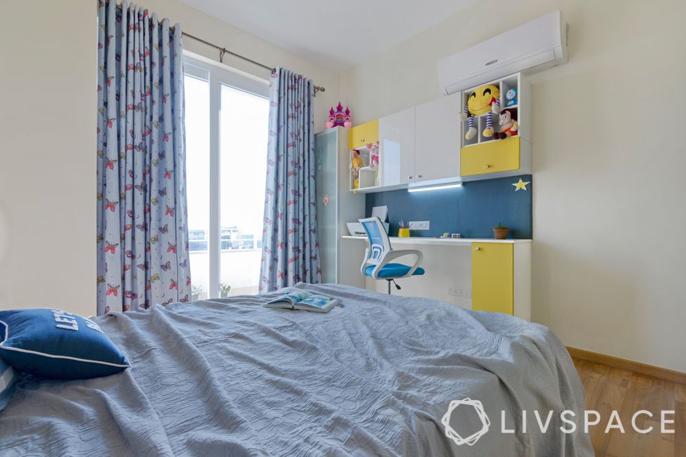 kids bedroom-grey bed-yellow wardrobe-study unit