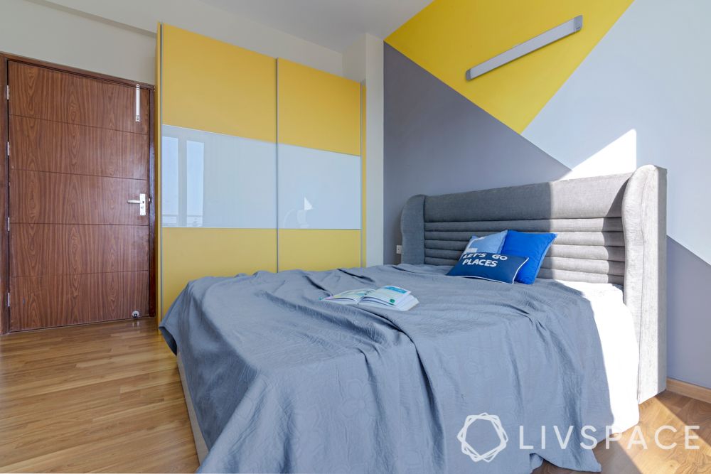 kids bedroom-grey bed-yellow wardrobe