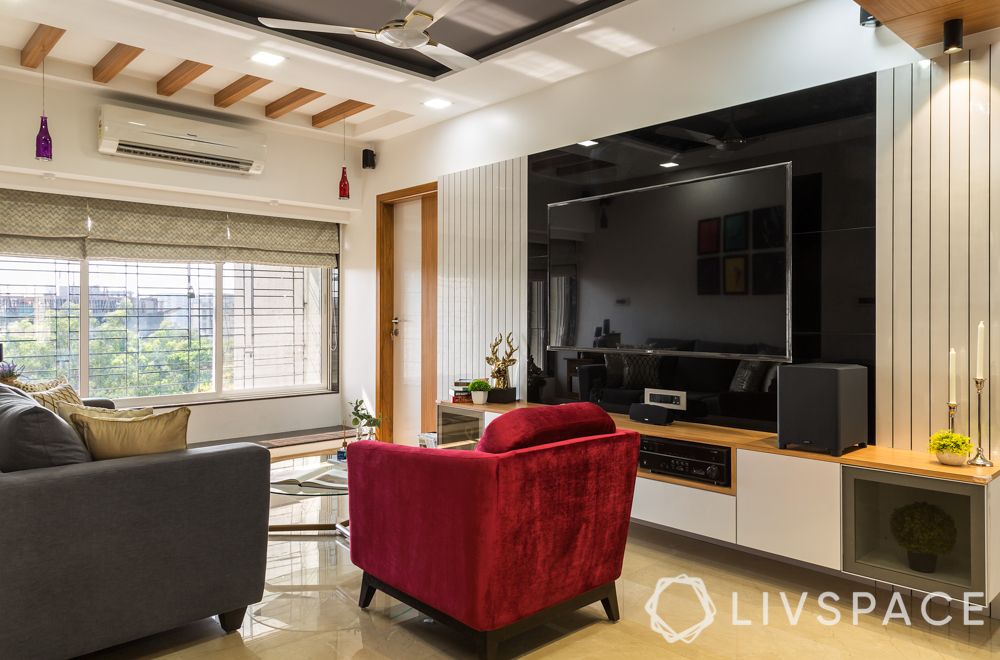 3bhk-flats-living-room-black-tv-unit-jinesh-gohil