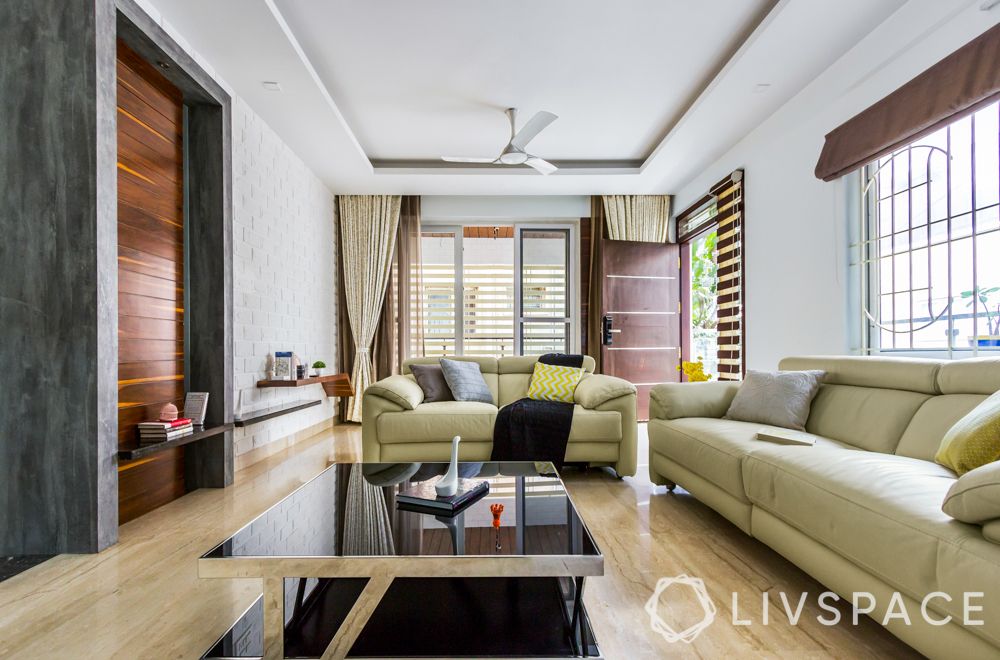 3bhk-flats-living-room-cream-sofas-suman-varma
