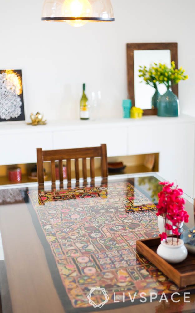 Glass top dining on sale table with pebbles