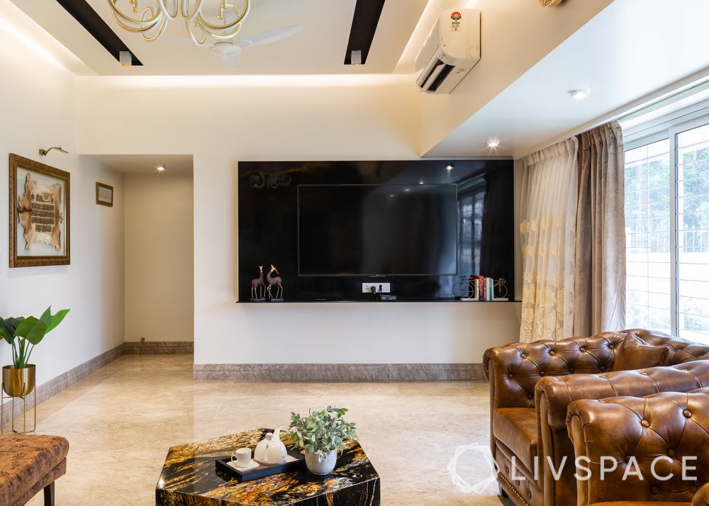 modern villa design-living room-brown leather sofa-black tv unit-stainless steel wall-gold wall-marble wall