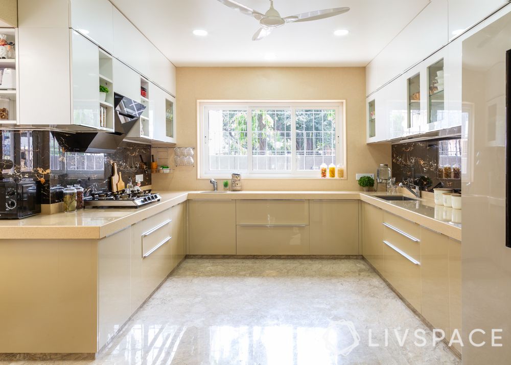 modern villa design-marble tile backsplash-hob-chimney-open shelves-beige and white cabinets