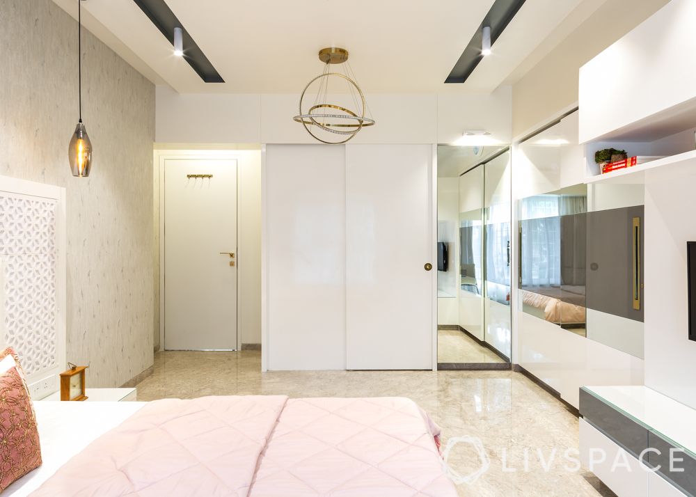 modern villa design-daughters bedroom-white headboard-pendant lights-jaali designs