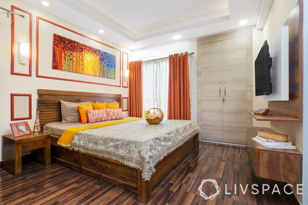 slat bed-wooden headboard-orange curtains