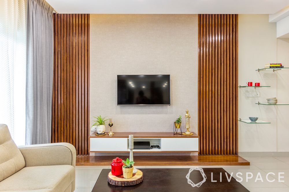 3 bhk house-tv unit design-wooden slats 
