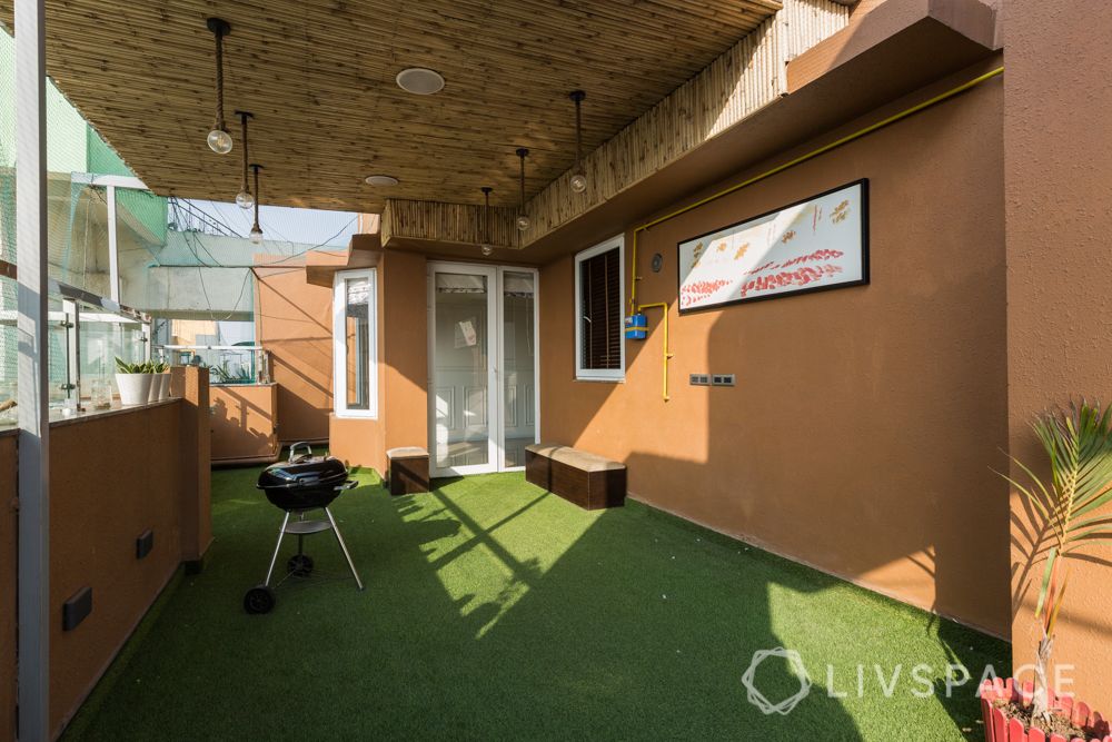 home balcony design-bamboo roof-turf-seating