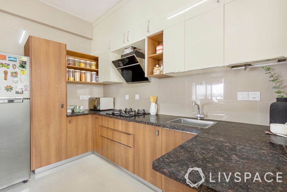 simple interior design-wooden shelves-acrylic cabinets-U shaped kitchen-tall unit