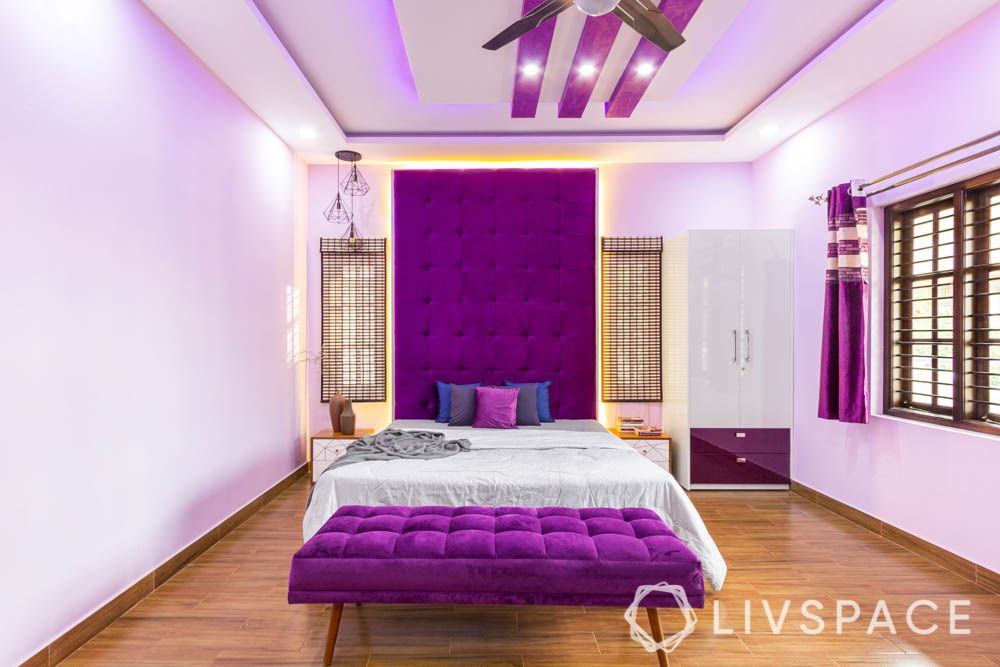 top 10 interior designers in bangalore-fabric headboard-white bed-purple bench-acrylic wardrobe