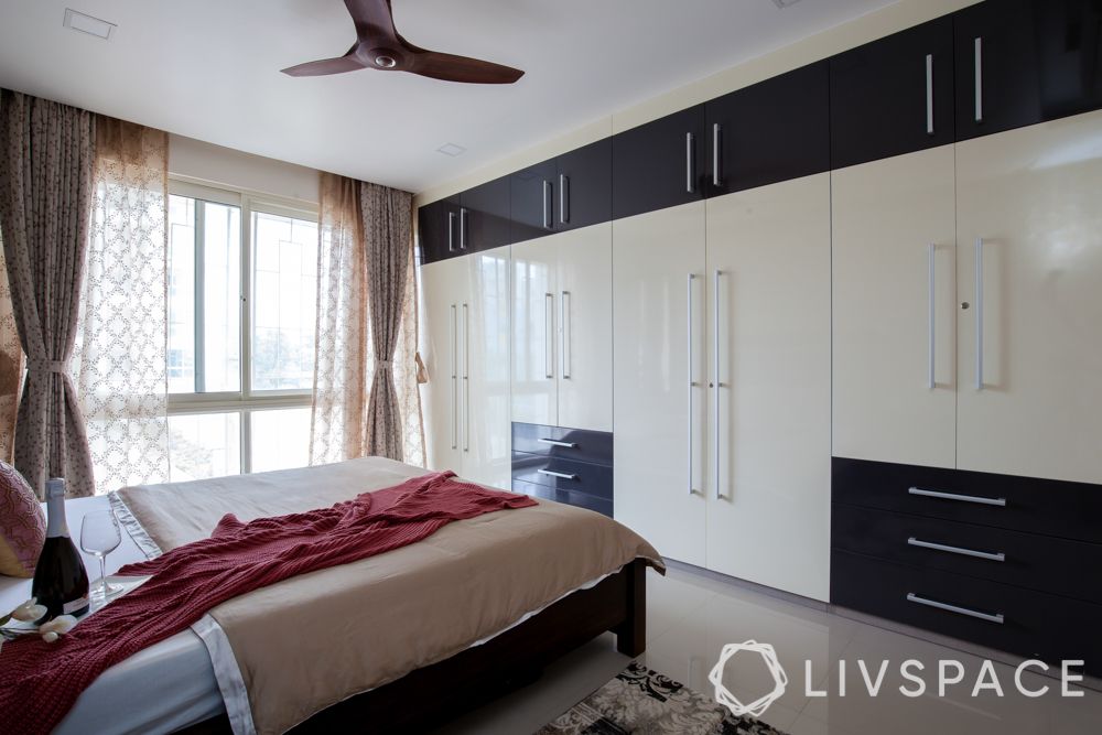 master bedroom design-materials-white and black wardrobes-hinged doors