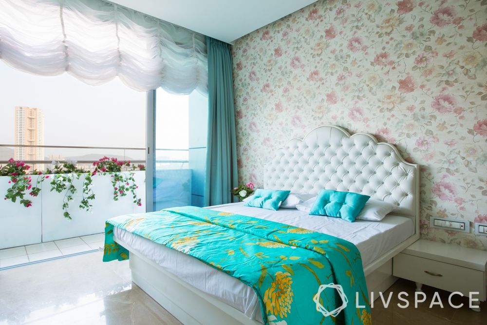 master bedroom design-white headboard-balcony designs-floral wallpaper