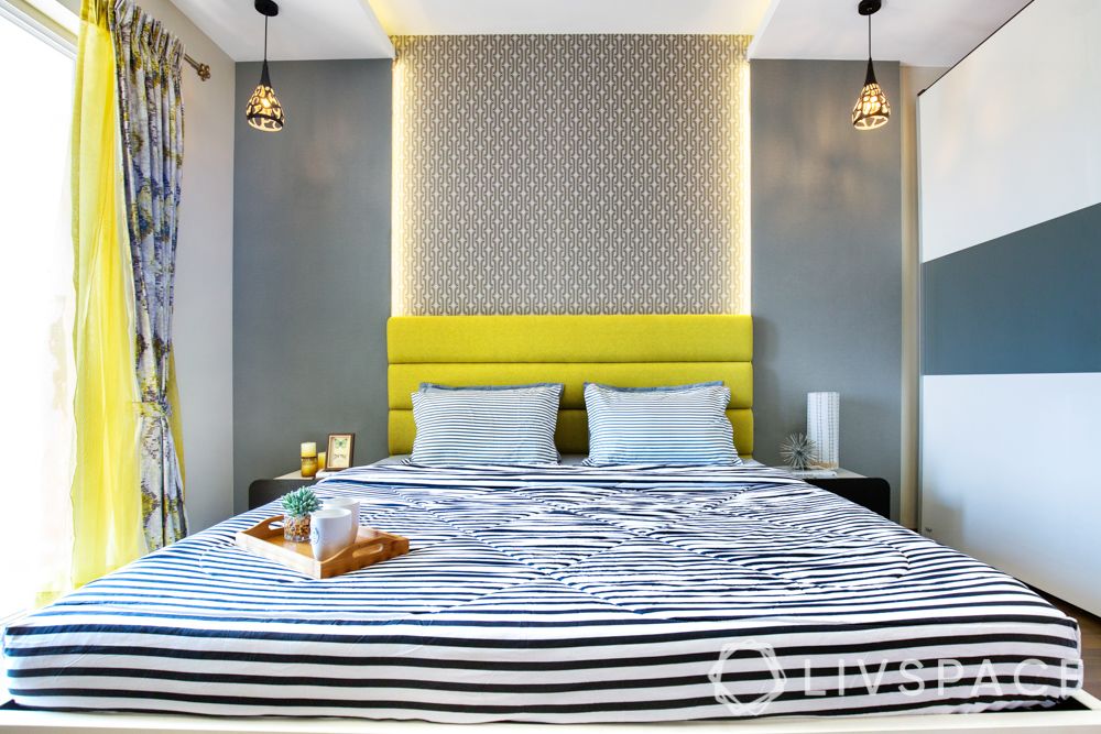 master bedroom design-backlit wall-yellow wall-hanging light