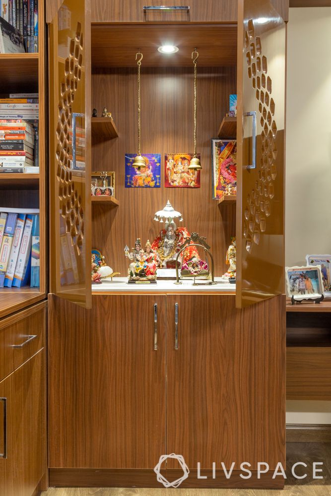 Pooja-room-designs-in-plywood-jaali-doors-storage