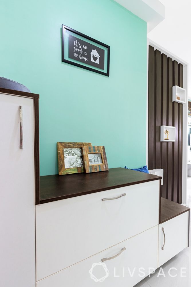 3 bhk flat design-blue wall ideas-white shoe cabinet