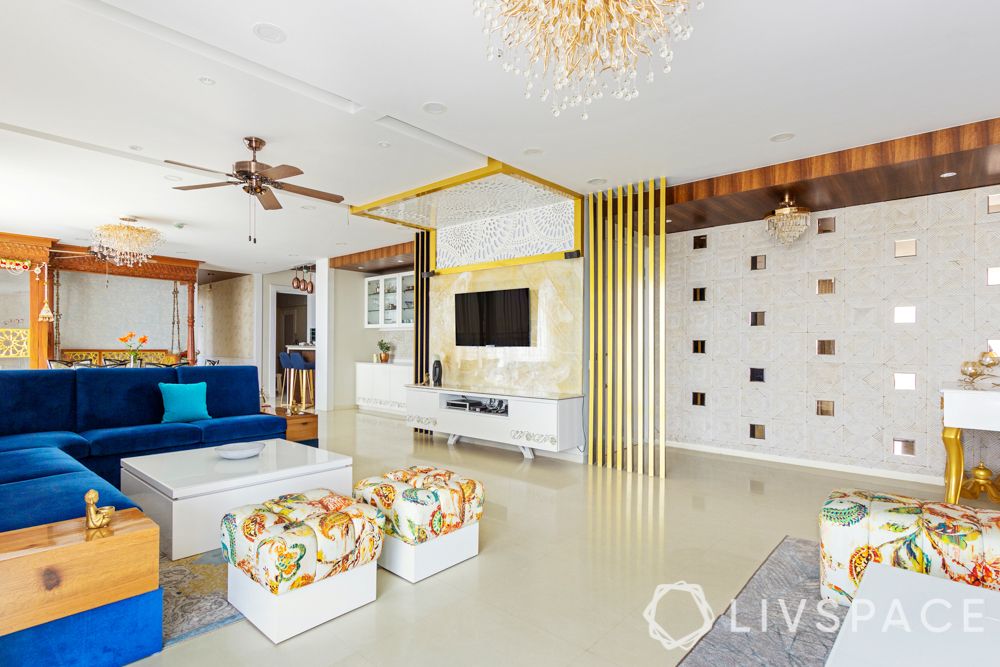 latest pop design-gold interiors-jaali tv unit-mirror wall