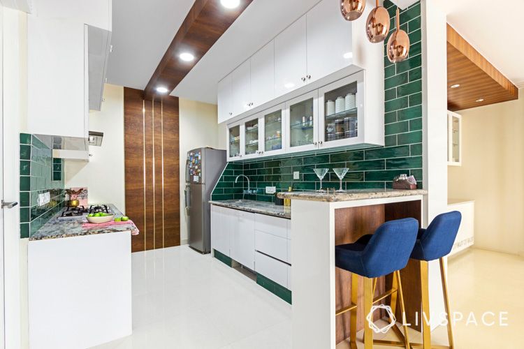 green kitchen tiles-wooden ceiling details