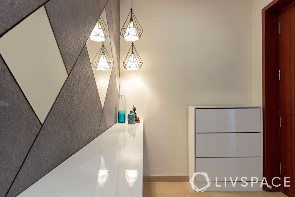 villa house design-stone finish wall-mirror wall-pendant lights-shoe cabinet