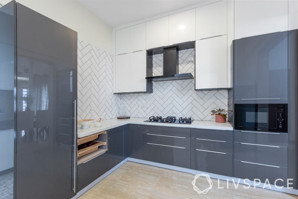 iles
villa house design-open kitchen-anti-scratch-subway tiles-herringbone pattern-high gloss laminate
