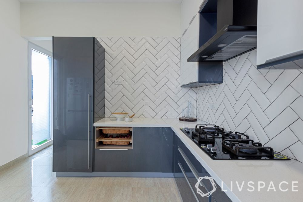 iles
villa house design-open kitchen-anti-scratch-subway tiles-herringbone pattern-high gloss laminate
