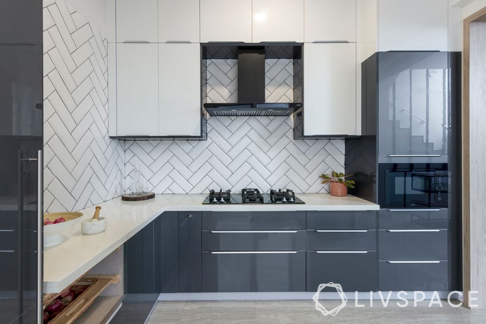 iles
villa house design-open kitchen-anti-scratch-subway tiles-herringbone pattern-high gloss laminate
