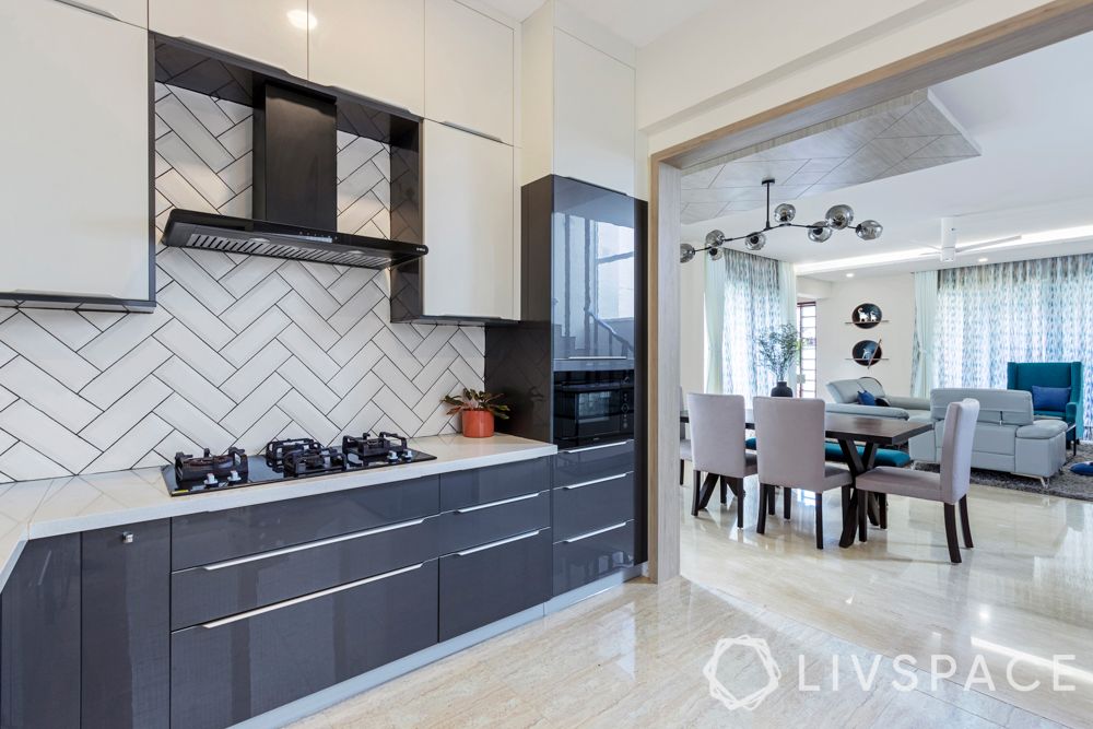villa house design-open kitchen-anti-scratch-subway tiles-herringbone pattern-high gloss laminate