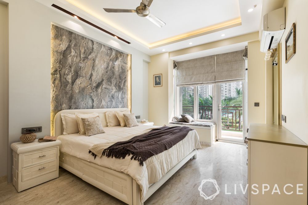 bedroom-layout-marble-feature-wall-bay-seating-balcony-side-table