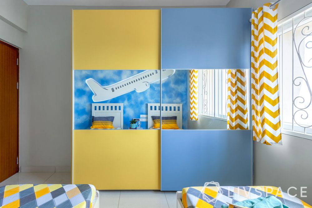 2bhk design-kids room-aeroplane mural-lighting ideas-membrane wardrobe