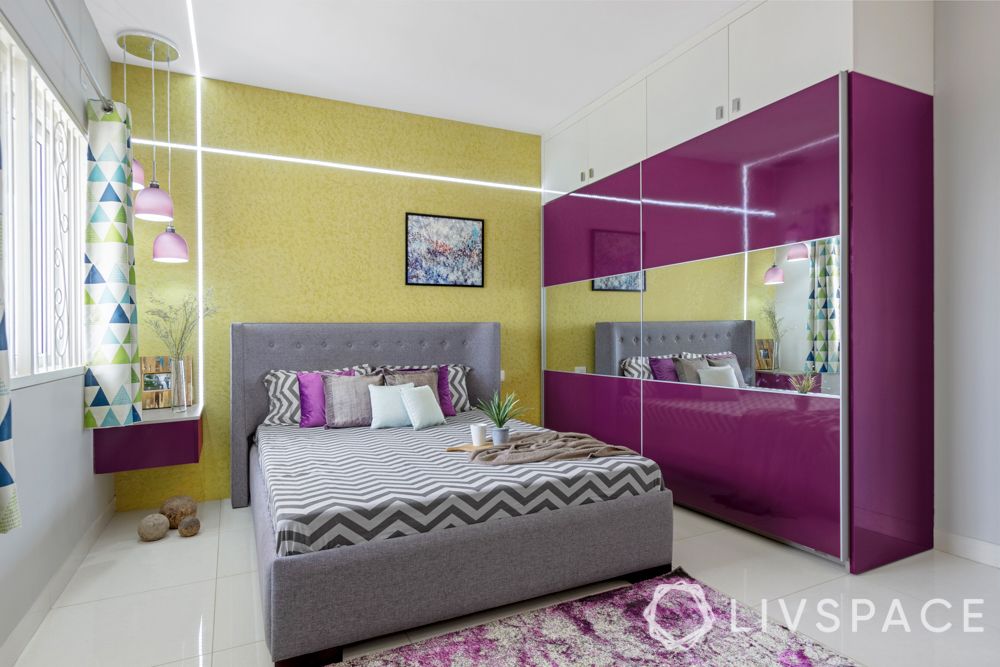 master bedroom-yellow textured paint-high gloss laminate wardrobe-false ceiling design