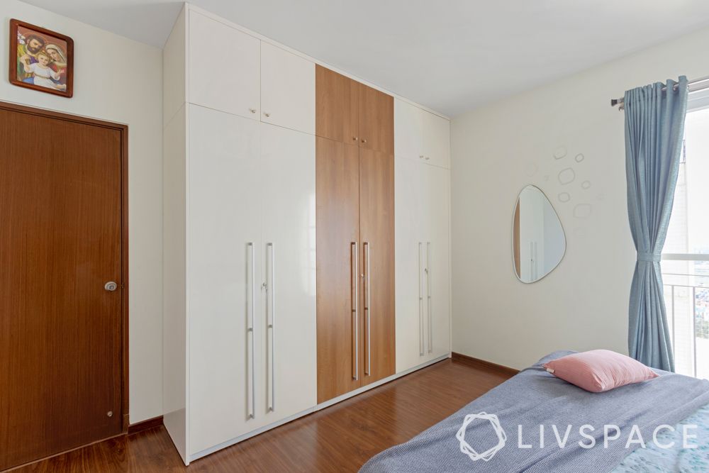 3 bhk flat interior images-white and brown wardrobe-membrane wardrobe