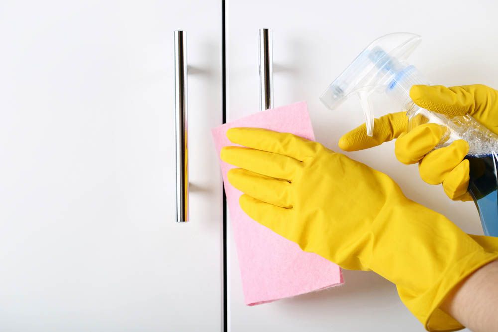 high-touch-surfaces-during-coronavirus-cabinet-handles-cleaning