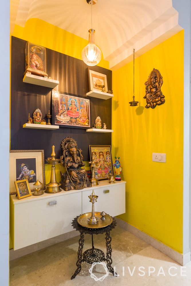 new-mandir-design-yellow-walls-lighting-bells-idols