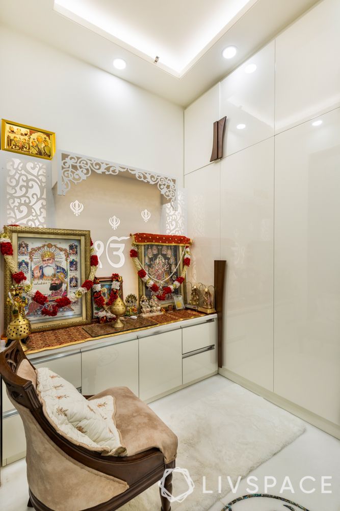 new-mandir-design-white-cabinets-chair-pooja-room