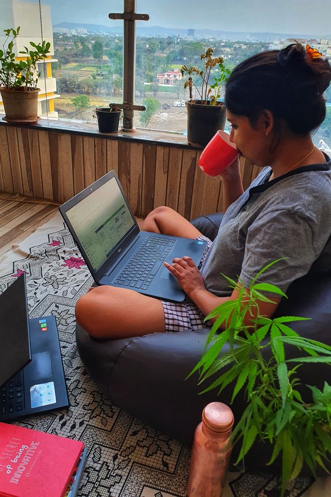 home office design-balcony workspace-plants-water bottle