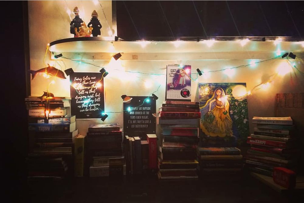 home office design-study unit-fairy lights-books-posters