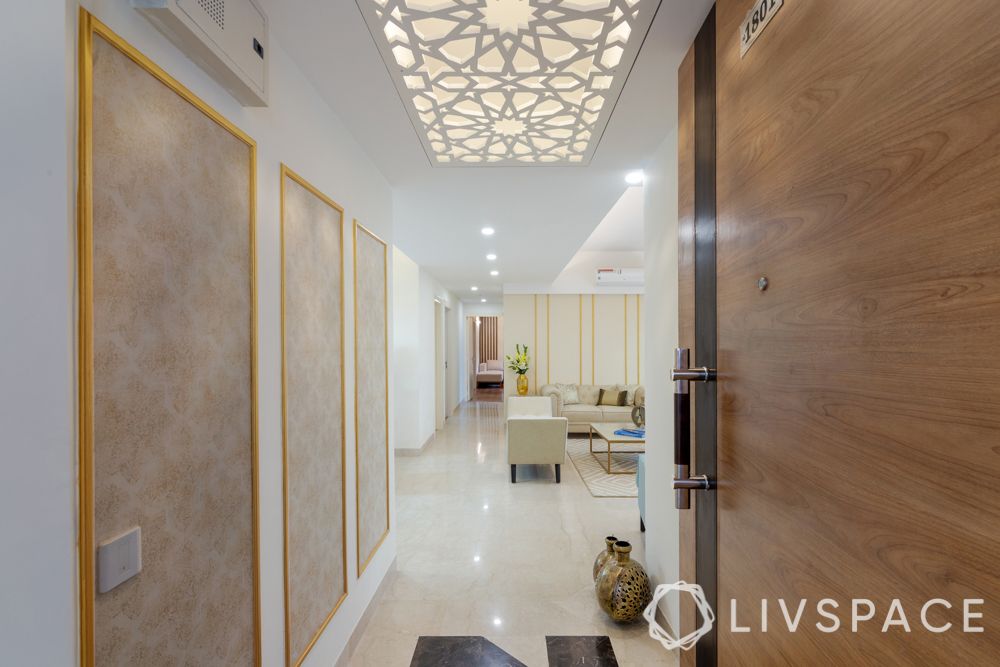 interior design company in gurgaon-foyer-jaali ceiling-wallpaper-wall trims