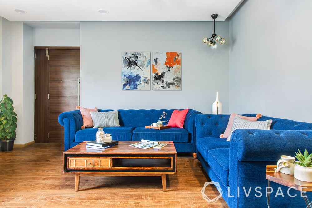 wooden center table-hexagonal sets-blue sofa-planters