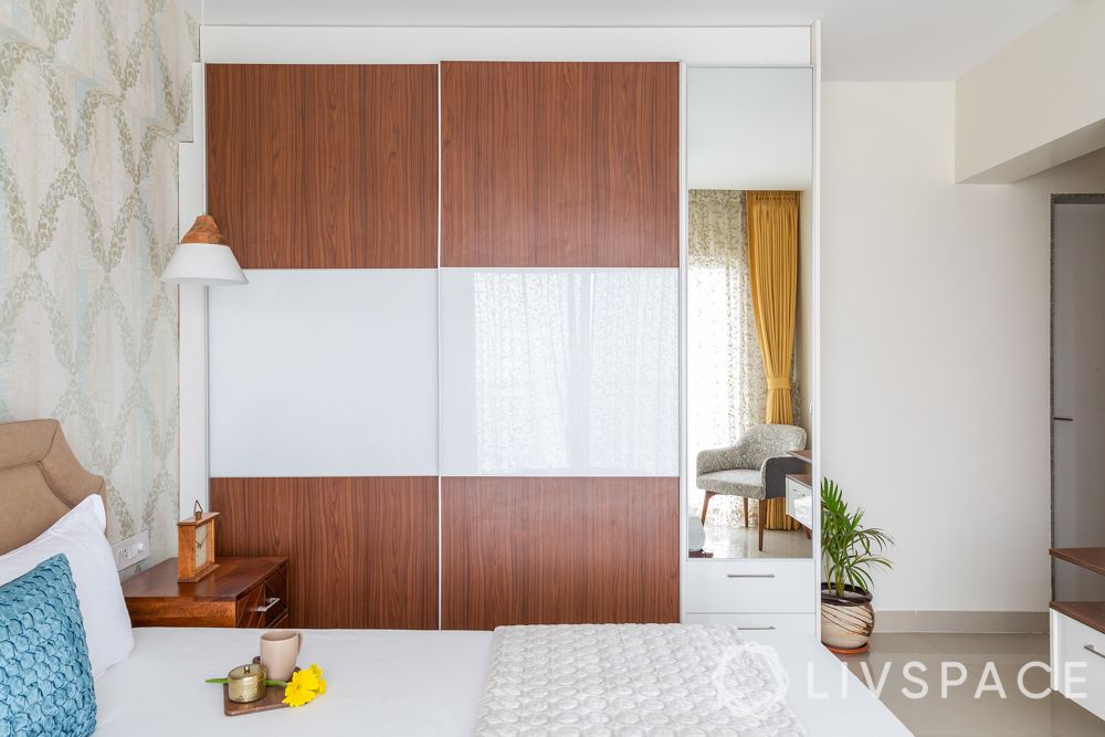 hinged or sliding doors-sliding wardrobe designs-lacquered glass panel-laminate wardrobe