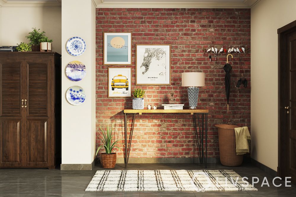 Foyer design-console table-brick wall-plants-wall art