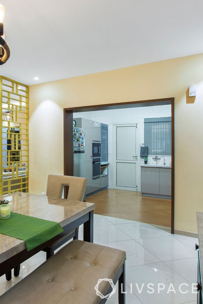 home interiors Bangalore-dining room-kitchen entrance-wood paneling