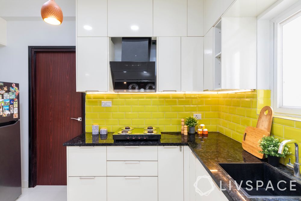 subway tiles-yellow backsplash-high gloss laminate cabinets